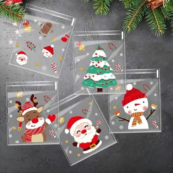 100 bucăți de pungi plastice autoadezive de Crăciun 10 x 10 cm Pungi de ambalare cu motive de Crăciun pentru dulciuri, cadouri, biscuiți și mărunțișuri | Produs vedetă